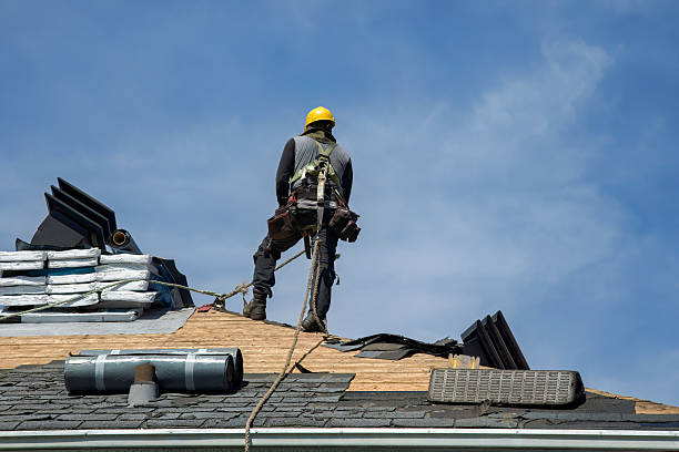 Professional Roofing technician working in Chester, VT